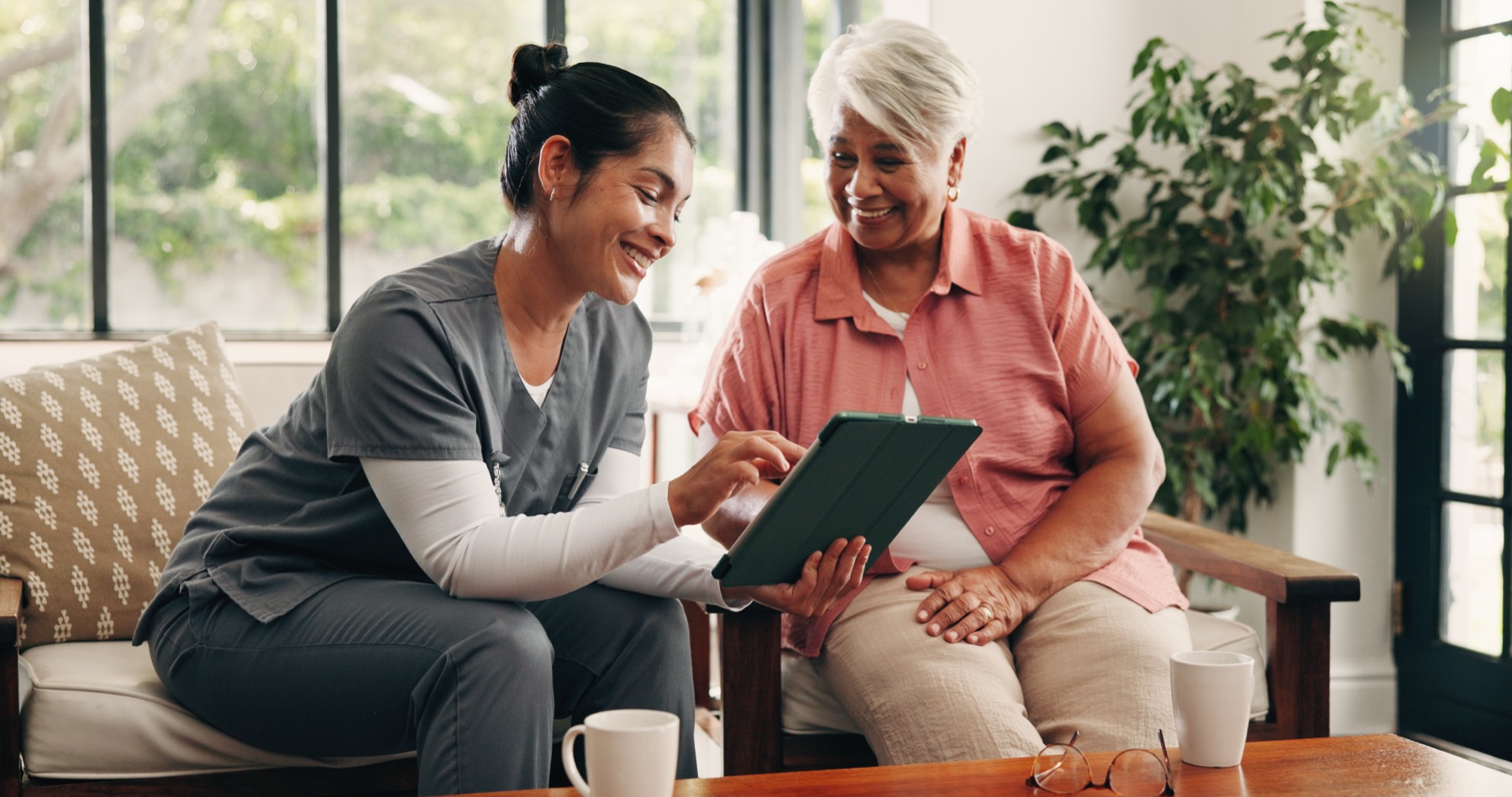 owner or administrator with caregiver, planning together